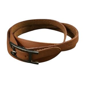 Hermès Hapi leather double choker or wrap bracelet with an H buckle closure.